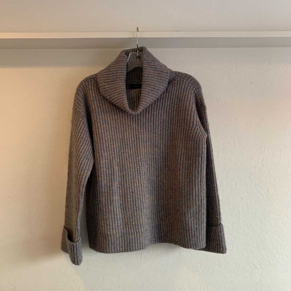 Knit turtleneck sweater with cuffed sleeves